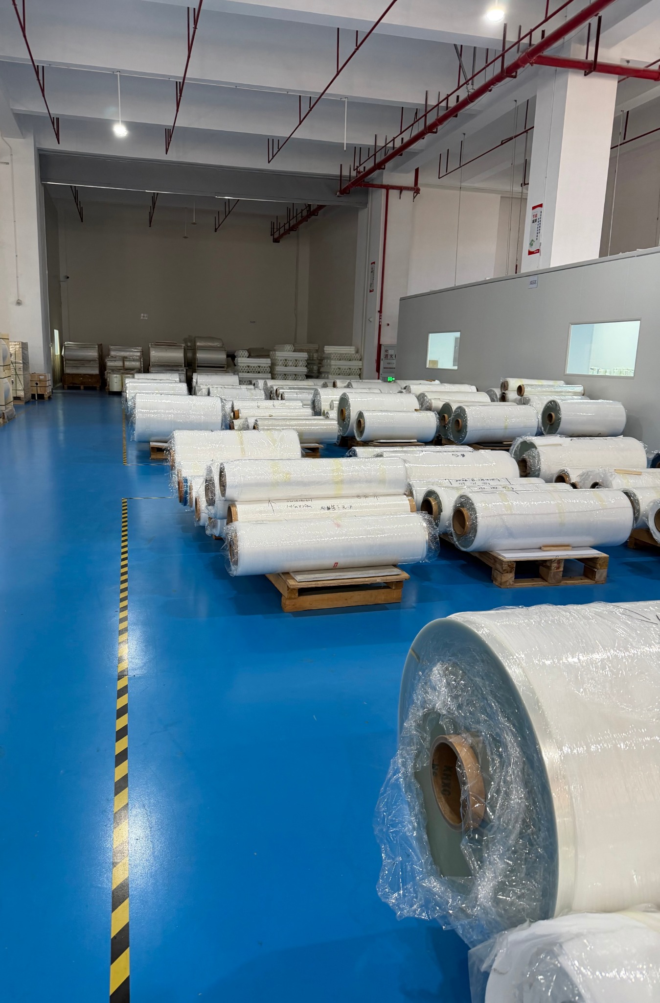 Material rolls stored in factory